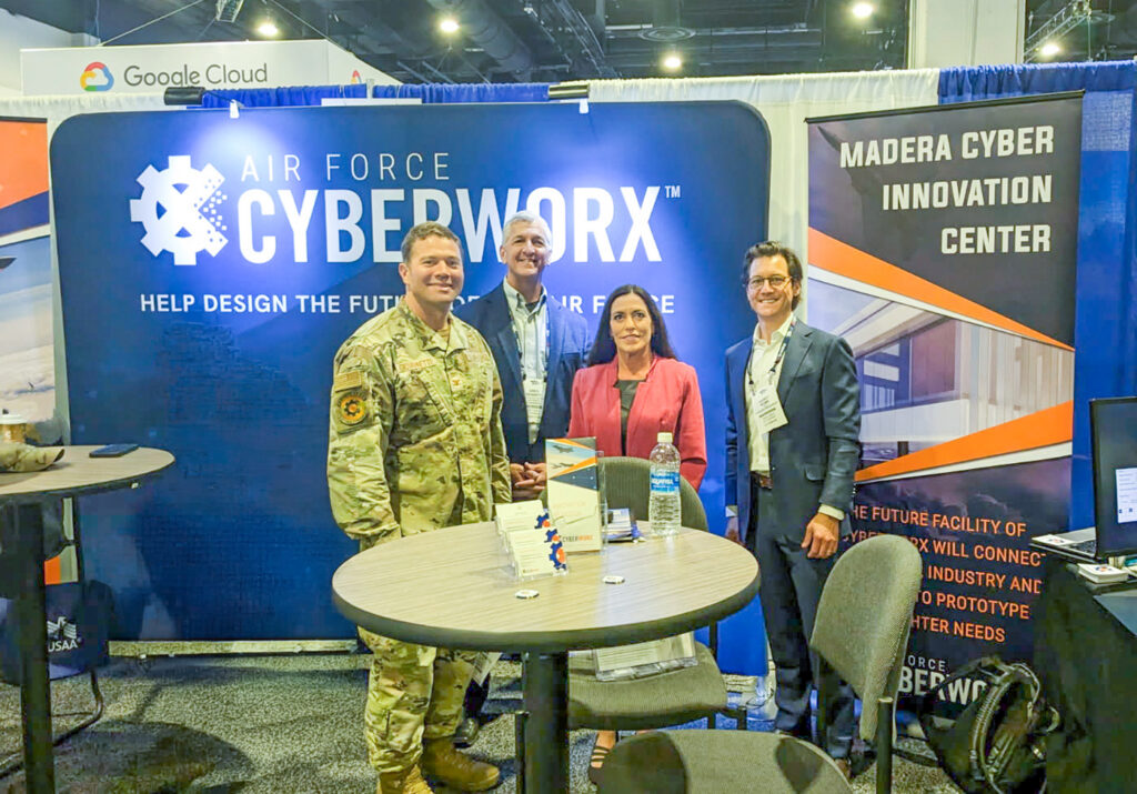 Pictured left to right: AF CyberWorx Director, Col. Robert Giovannetti, Greg Bennett, Julie Perkins with Catalyst Campus, and Carey Rome of CYPR AI.